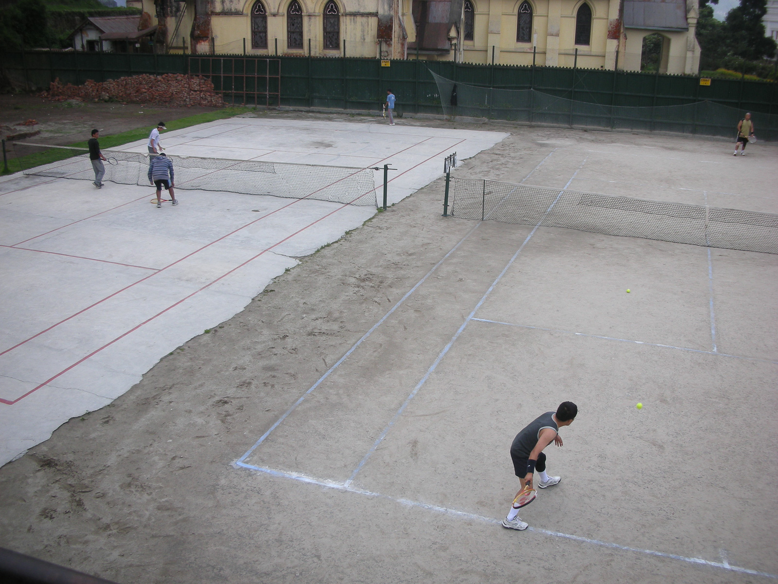 Playing tennis in Darjeeling, India